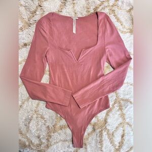 Free People Intimately Zoe Pink Long Sleeve Bodysuit